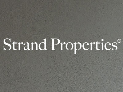 real estate agent logo Strand Properties